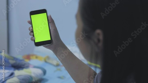 Woman using touch holding Smartphone with green screen, Doing Swiping. Woman close up Smartphone touch slow motion