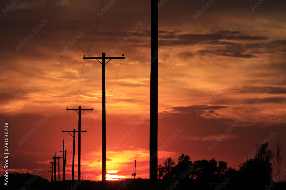 Sunset with Power Line silhouettes and a Sunset with clouds