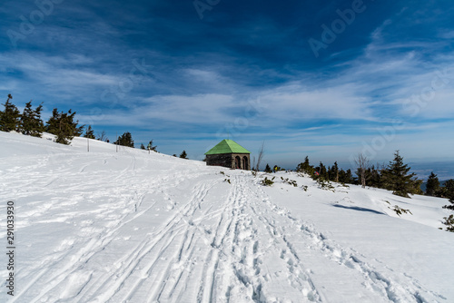 stone hut on Jeleni studanka in winter Jeseniky mountains in Czech republic