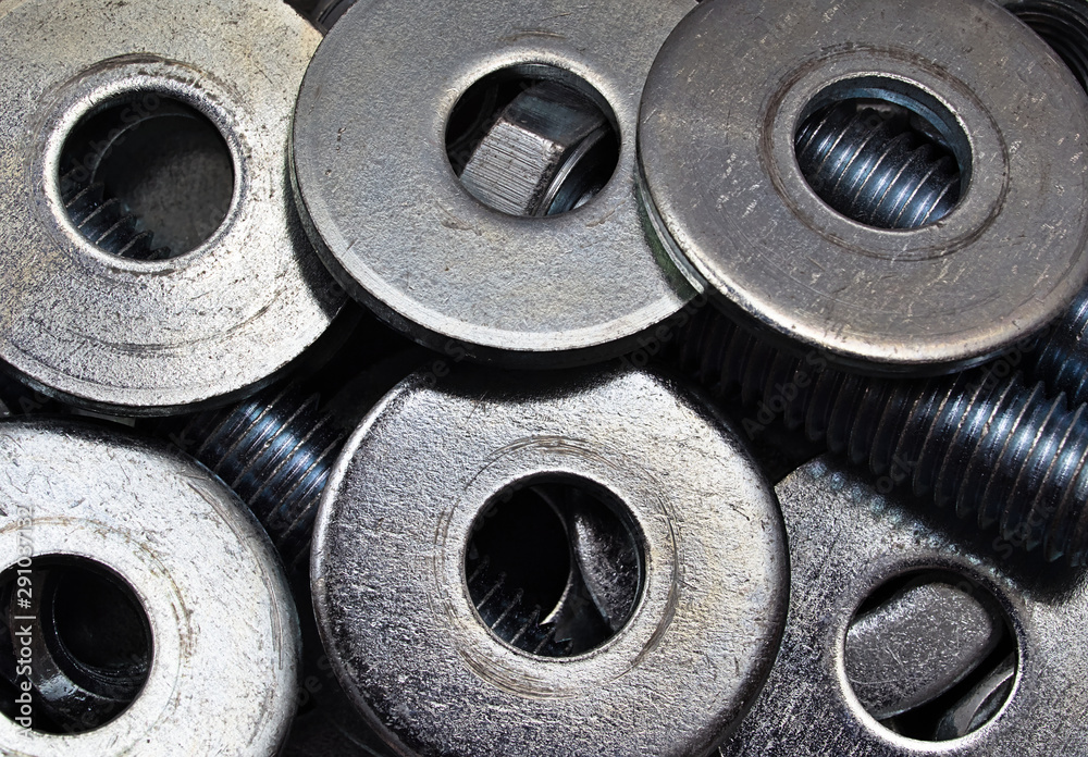 Group of Industrial steel washers and bolts, zinc heap chrome. Industrial background. Group of Industrial steel washers and bolts, zinc heap chrome. Industrial background.