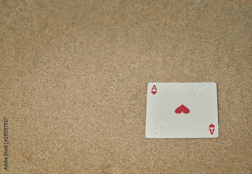 Heart card on beach sand and perfect for backgrounds with space for texts photo