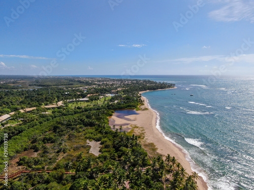 Aerial view of tropical beach and turquoise clear sea water