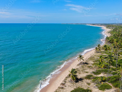 Aerial view of tropical beach and turquoise clear sea water © Unwind