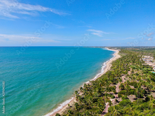 Aerial view of tropical beach and turquoise clear sea water