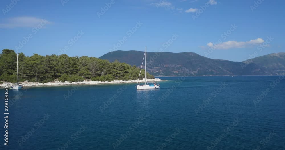 Sailing boat cruising the turquoise waters of Cephalonia island Greece, aerial drone shot Sailing boat cruising the turquoise waters of Cephalonia island Greece, aerial drone shot