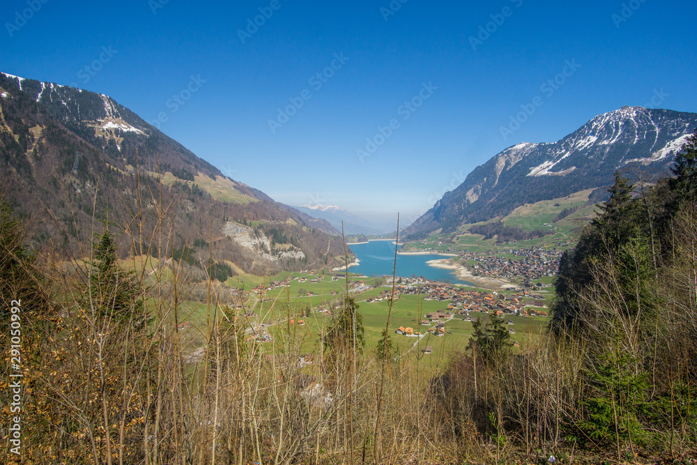 An amazing drive around the beautiful Lungern village and the Lungernersee Lake in Switzerland , this spectacular valley offers a breathtaking views of mountains and the valley this crystal blue lake 