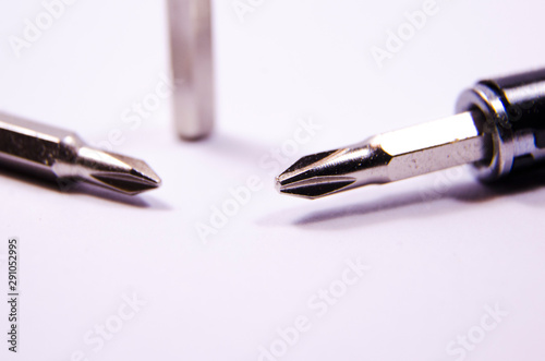 close up macro photo or photography of a set tool bits of torque bits with blured bokeh effect