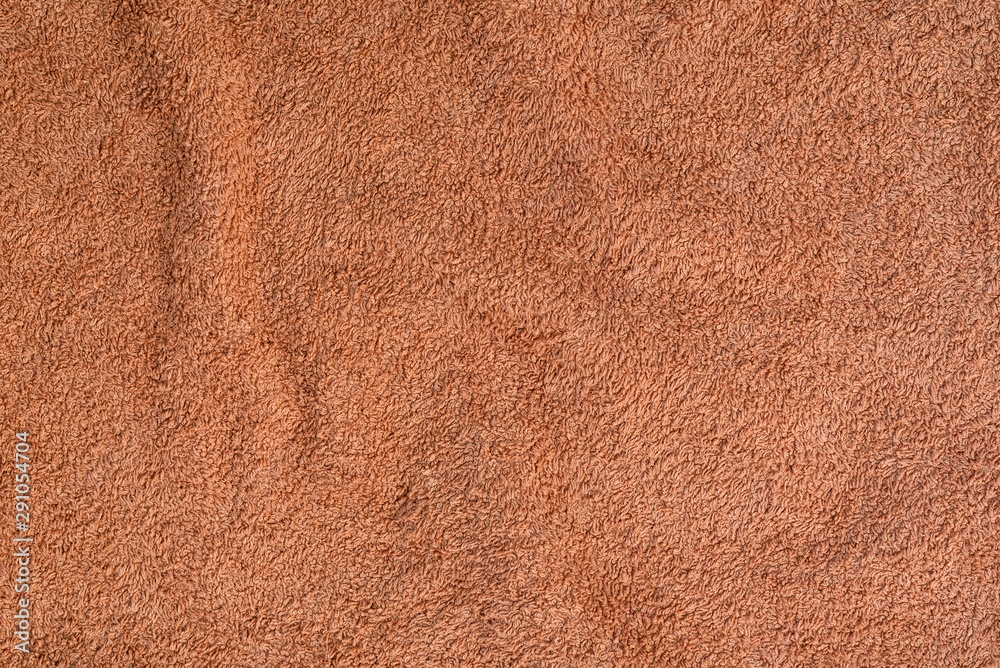 Texture terry fabric towel with pleats. Sand color Texture terry fabric towel with pleats. Sand color