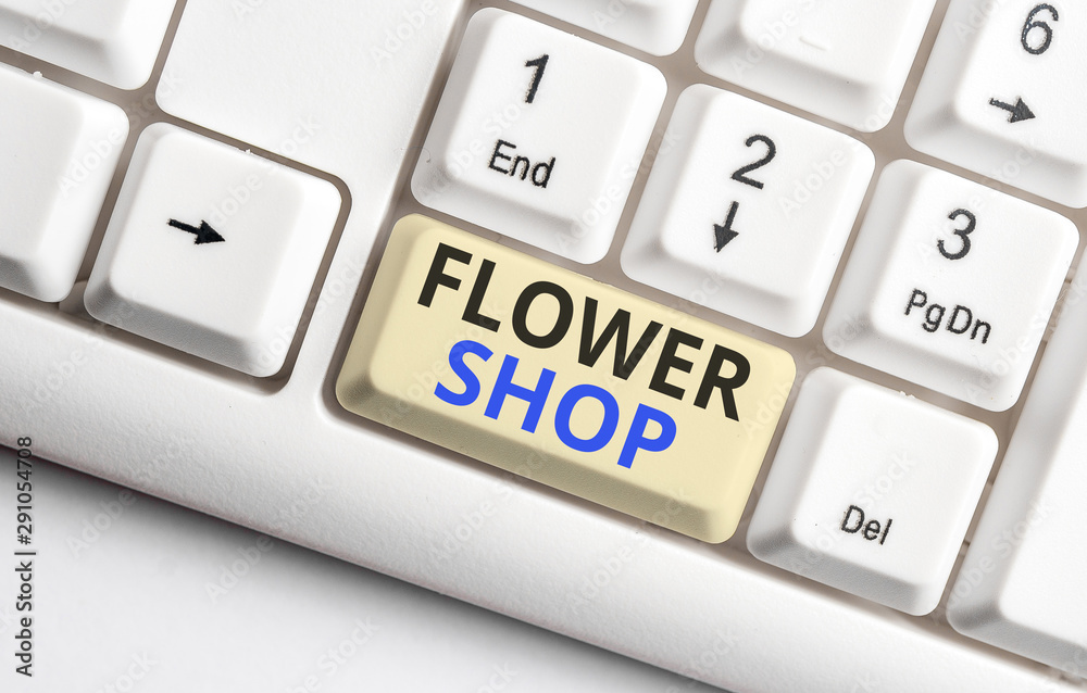 Text sign showing Flower Shop. Business photo showcasing where cut flowers are sold with decorations for gifts White pc keyboard with empty note paper above white background key copy space Text sign showing Flower Shop. Business photo showcasing where cut flowers are sold with decorations for gifts White pc keyboard with empty note paper above white background key copy space