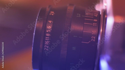 Closeup Shot Of Lens Of Vintage Film Camera photo
