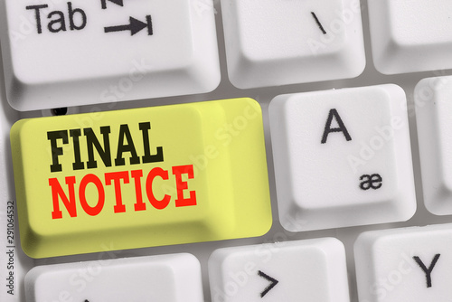 Handwriting text Final Notice. Conceptual photo Formal Declaration or warning that action will be taken White pc keyboard with empty note paper above white background key copy space