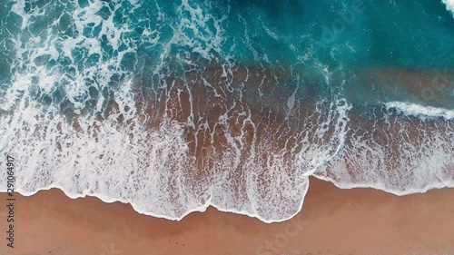 Aerial view of waves in a beach. photo