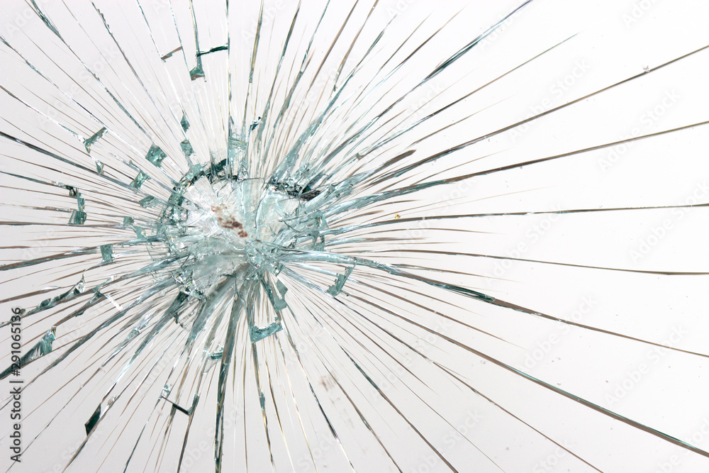 Obraz premium Cracked glass on a white background texture