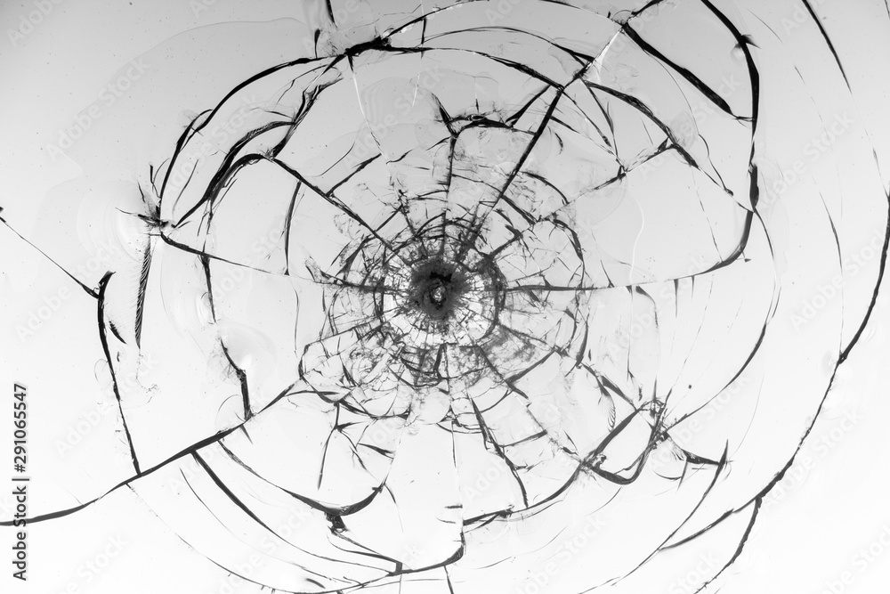 Obraz premium Cracked glass on a white background texture