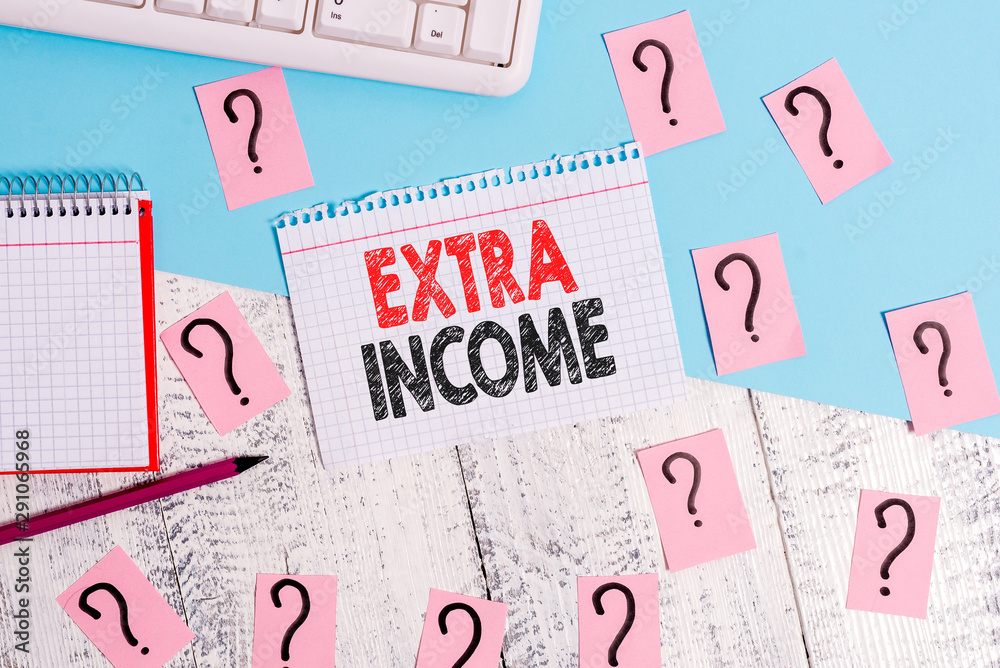 Text sign showing Extra Income. Business photo showcasing Additional fund received or earned from a non regular basis Writing tools, computer stuff and math book sheet on top of wooden table Text sign showing Extra Income. Business photo showcasing Additional fund received or earned from a non regular basis Writing tools, computer stuff and math book sheet on top of wooden table