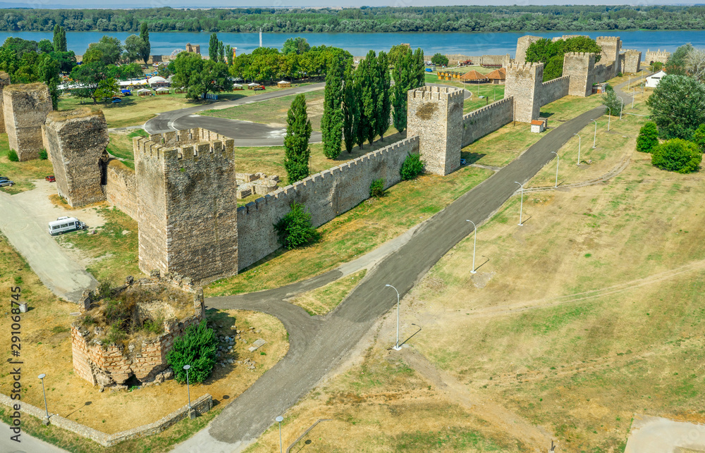 Aerial view of Smederevo (Szendro) Byzantine and Ottoman castle and walled town along the Danube river in Serbia former Yugoslavia with moat and partially restored towers