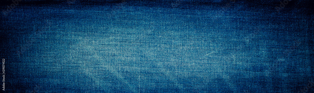 Retro color tone of blue denim jeans fabric texture for background website fashion design or backdrop product.