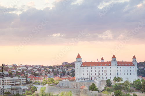 Beautiful view of the Bratislava castle on the banks of the Danube in the old town of Bratislava, Slovakia on a sunny summer day.