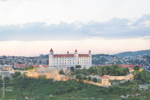 Beautiful view of the Bratislava castle on the banks of the Danube in the old town of Bratislava, Slovakia on a sunny summer day.