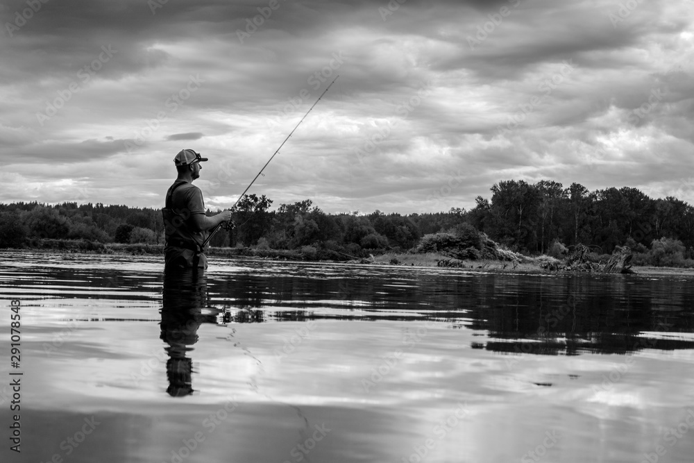 man fishing in the river