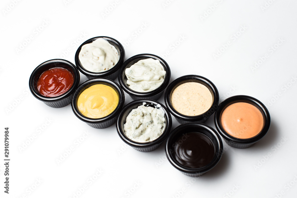different sauces in assortment in an black sauces different sauces in assortment in an black sauces