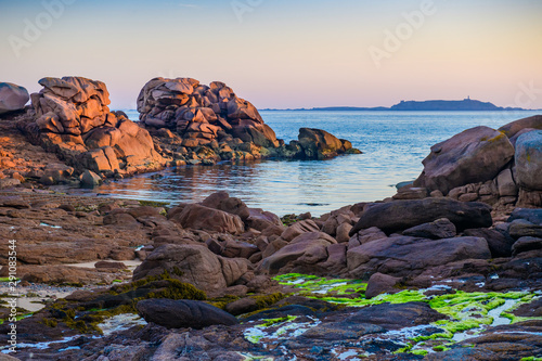 The incredible Pink Granite Shore near the village of Plumanach at sunrise.The coast of Pink Granite is a unique place in Brittany. France © alexanderkonsta