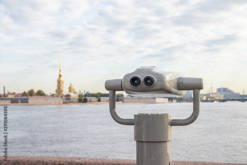 Stationary binoculars. gadgets at viewing platforms. big city binoculars. Watch with binoculars. panorama of the city.