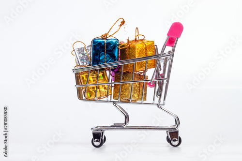 shopping cart with gift box, merry christmas, happy new year concept.