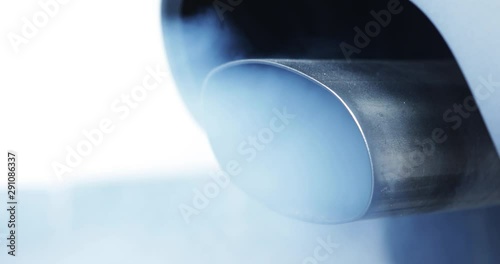 Air pollution smoke from car exhaust pipe. Shot in 4k resolution photo
