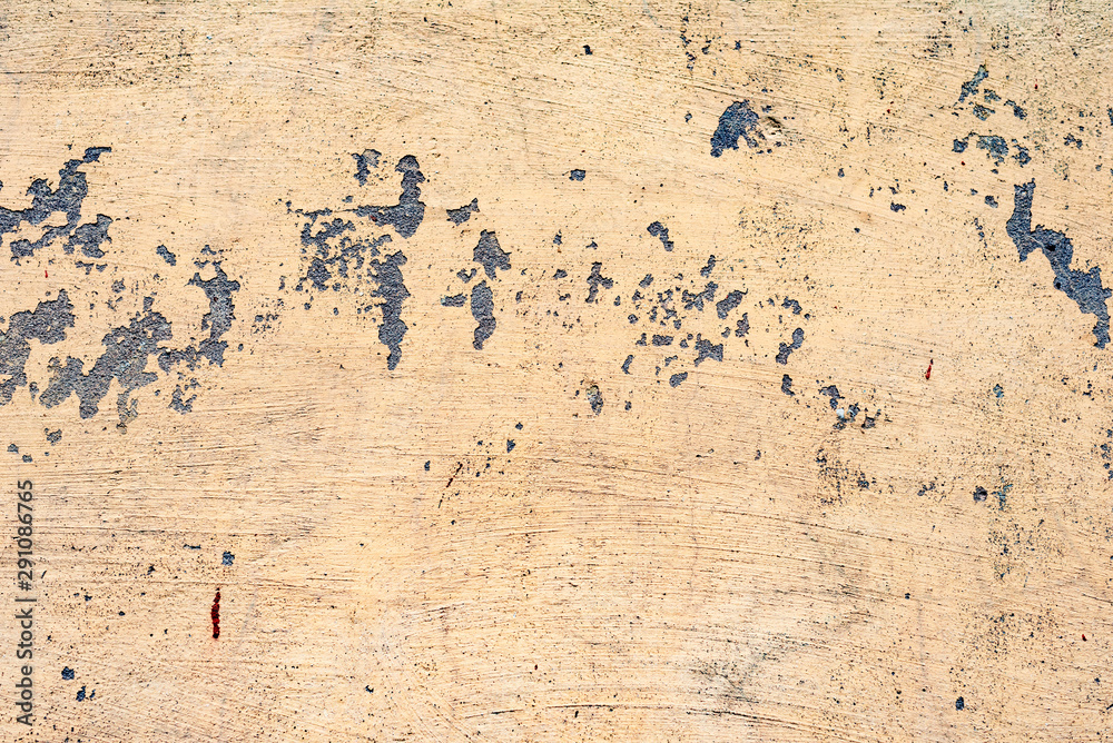 Texture of a concrete wall with cracks and scratches which can be used as a background Texture of a concrete wall with cracks and scratches which can be used as a background