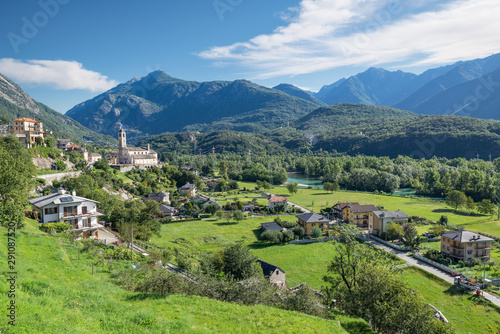 Crevoladossola at the foot of the Alps in Piedmont, on the Sempione road in val d'Ossola, Italy. Can be seen the church of Saints Peter and Paul and Toce river at the naturalistic oasis of Lake Tana