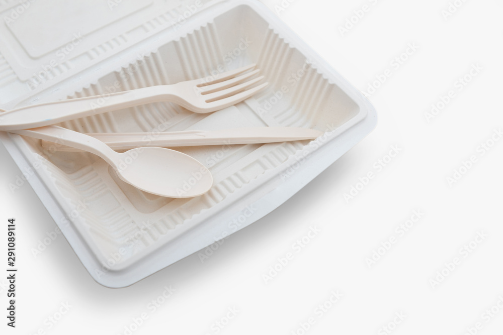 Biodegradable plastic lunch box, spoon and fork on white background isolate with clipping path - obrazy, fototapety, plakaty 