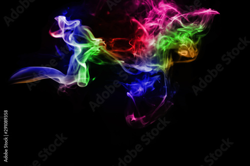 colorful smoke on dark background. Violet and blue smoke texture on a black background. Texture and abstract art.