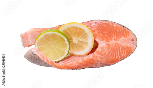 Steak of red fish, salmon with lemon, rosemary and thyme. Trout on white background.