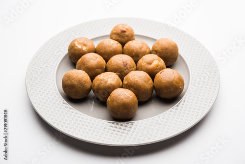 Churma Ladoo   atta laddoo   wheat flour laddu made using ghee and jaggery or sugar. selective focus