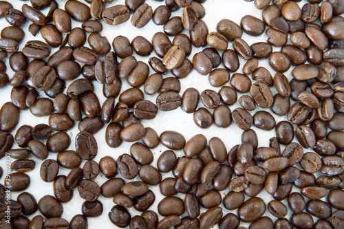 Scattered Coffee Beans on white background