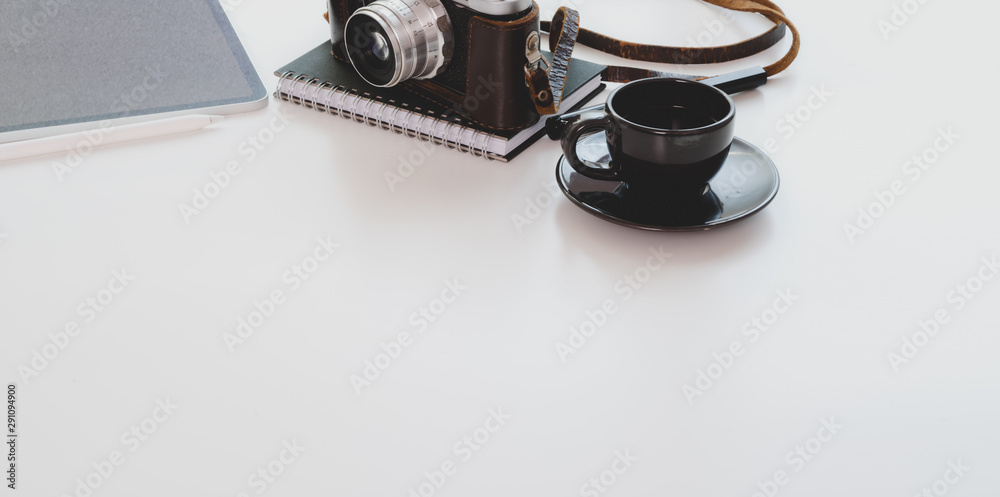 Close-up view of photographer workplace with copy space and office supplies Close-up view of photographer workplace with copy space and office supplies