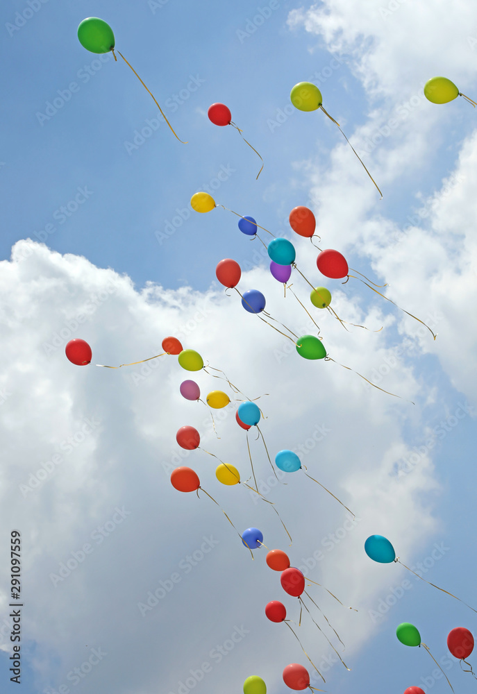 many balloons fly high in the sky with white clouds many balloons fly high in the sky with white clouds