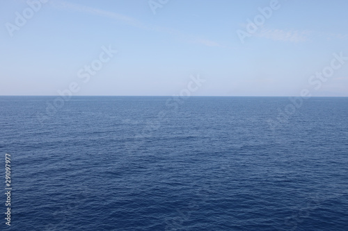 simple sea and blue sky background