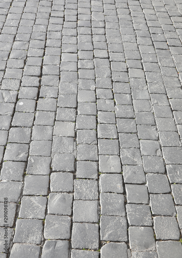 background of gray tiles called in Italian Sampietrini or pave i background of gray tiles called in Italian Sampietrini or pave i