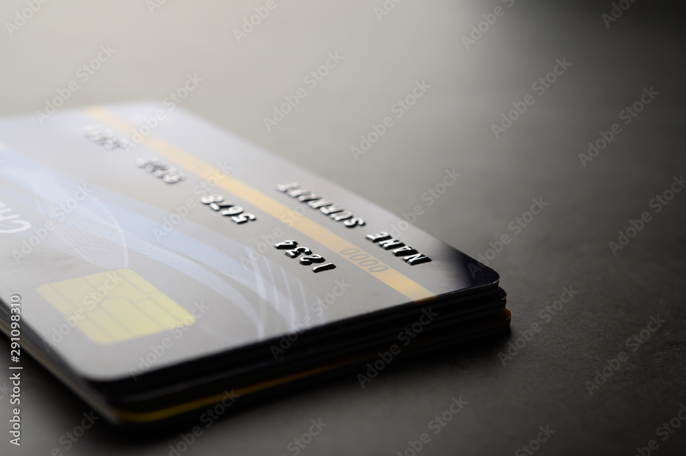 Credit cards that are stacked neatly together,selective focus