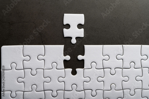 Jigsaw puzzle with missing piece. Missing puzzle pieces