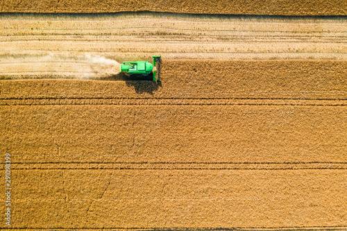 Flying above small harveste...