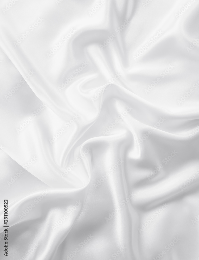 Obraz premium Beautiful smooth elegant wavy white satin silk luxury cloth fabric texture, abstract background design. Copy space. Wedding, engagement concept.