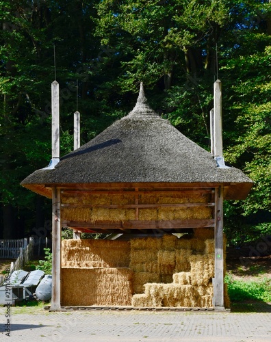 traditional haystack or hayrick with thatched roof in holland, the Veluwe.