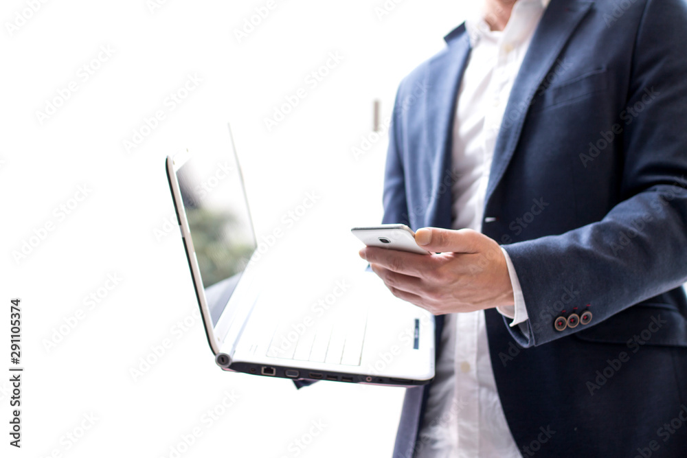businessman with laptop and cellphone businessman with laptop and cellphone