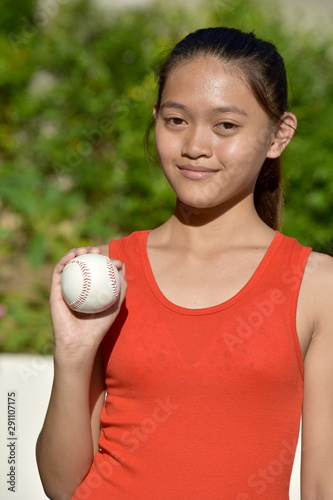 Serious Asian Female Athlete With Baseball photo