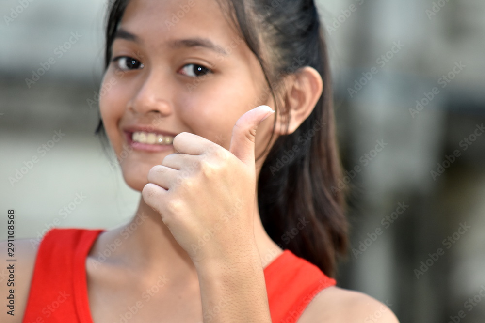 A Minority Girl With Thumbs Up A Minority Girl With Thumbs Up