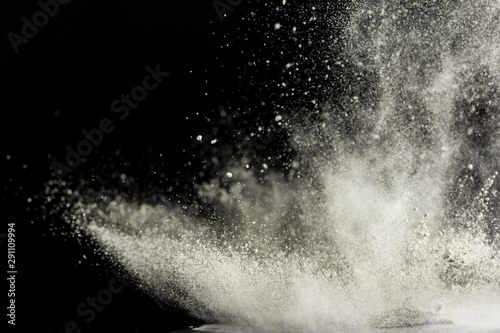 explosion of colored powder on a black background, freezing macro