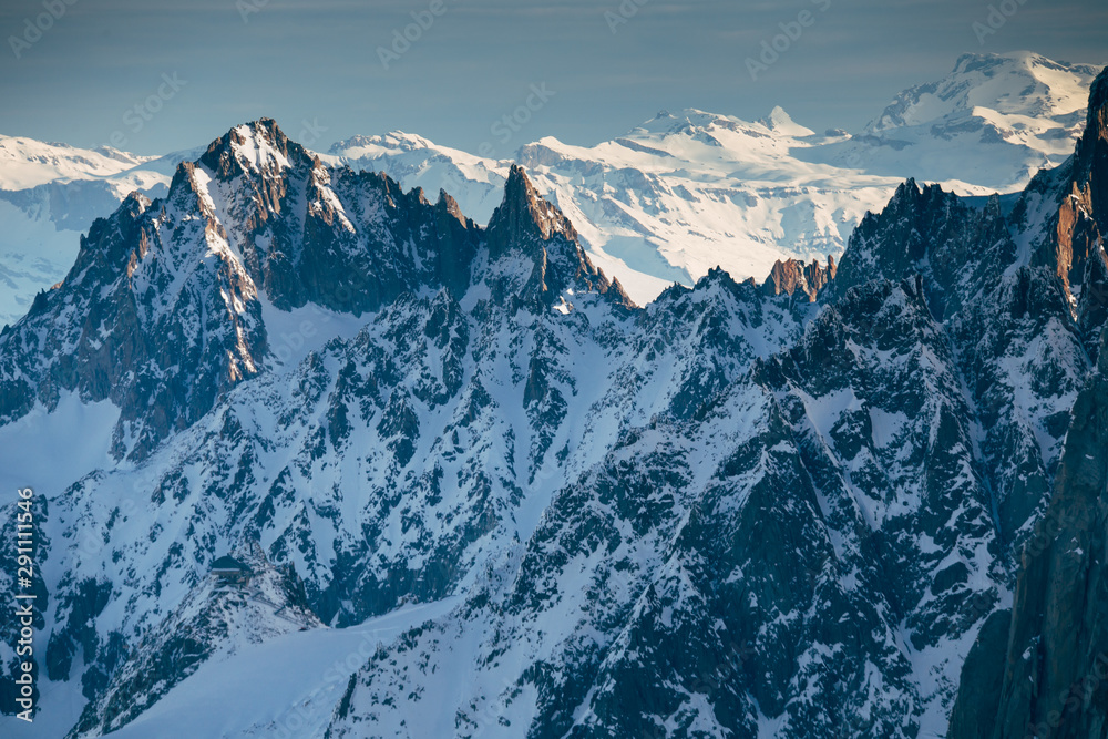 Obraz premium View from Aiguille du Midi, France. Skiers going down on Mer de Glace .